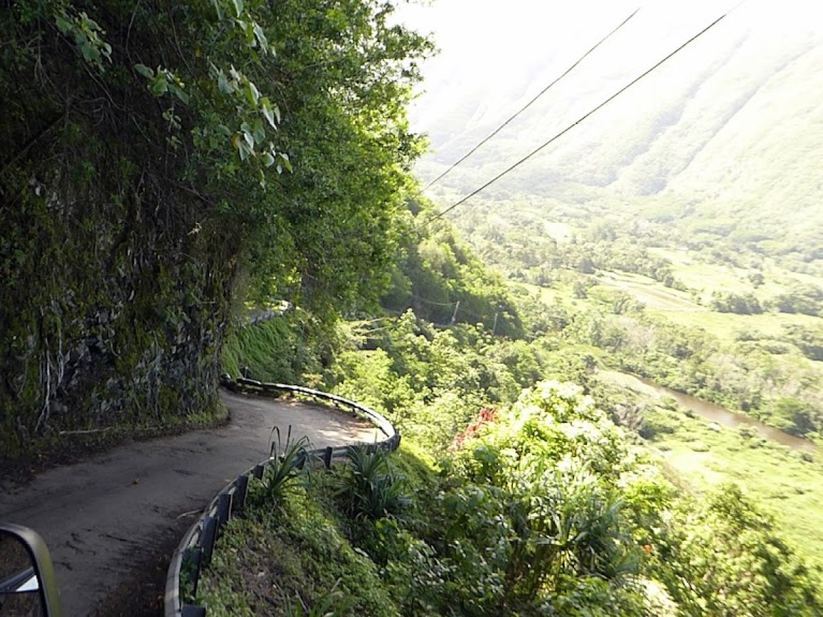 a car parked on the side of a mountain