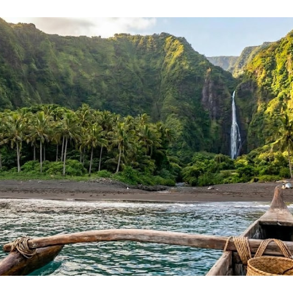 Canoe approaching beach with palm trees and waterfall in lush green valley.